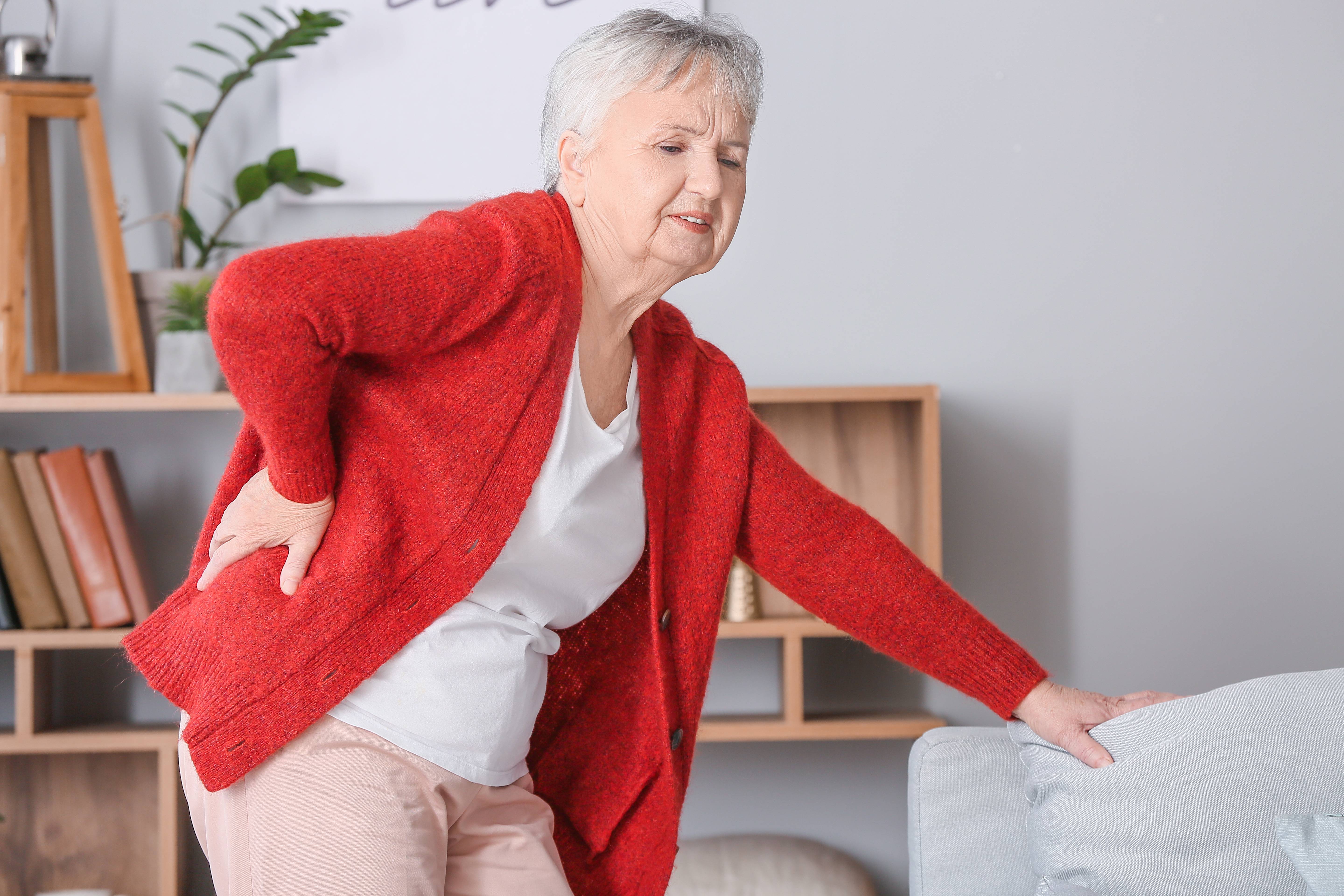 Senior woman suffering from back pain 